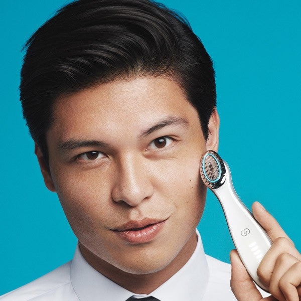 ageLOC Boost model image Man holding ageLOC Boost